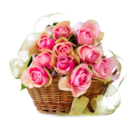 Roses in the Basket isolated on a White Background の写真素材