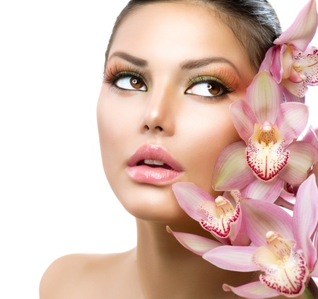 Beautiful Girl With Orchid Flowers  Beauty Model Woman Face の写真素材