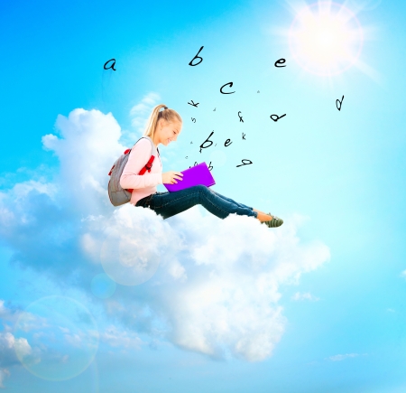 School Girl or Student on a Cloud Reading a book  Education の写真素材