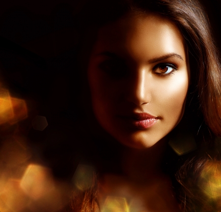 Beauty Girl Dark Portrait with Golden Sparks  Mysterious Woman