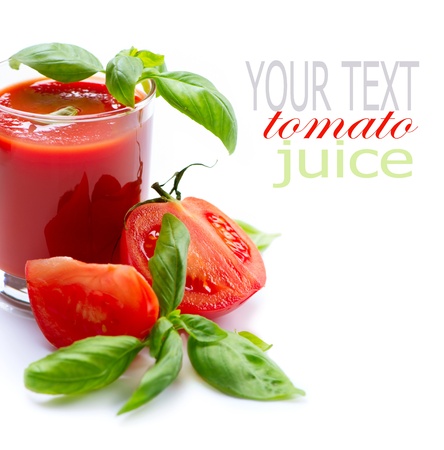 Tomato Juice and Fresh Tomatoes isolated on a White Background Tomato Juice and Fresh Tomatoes isolated on a White Background