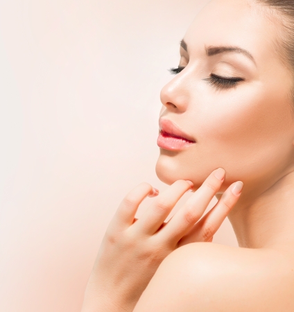 Spa Girl  Beautiful Young Woman Touching Her Faceの写真素材