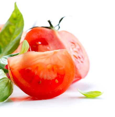 Fresh Tomatoes isolated on a White Background の写真素材