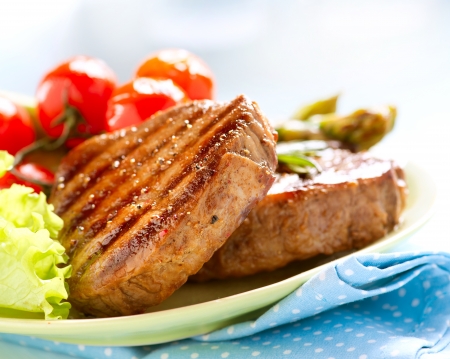 Grilled Beef Steak Meat over White の写真素材