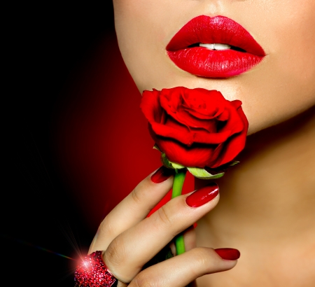 Beautiful Red Lips, Nails and Rose Flower  Beauty Girl の写真素材
