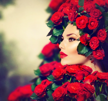 Beauty Fashion Model Girl Portrait with Red Roses Hairstyle の写真素材