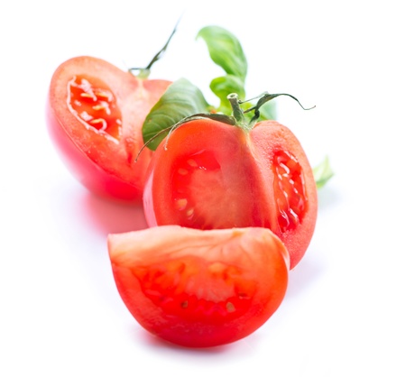 Fresh Tomatoes isolated on a White Background の写真素材