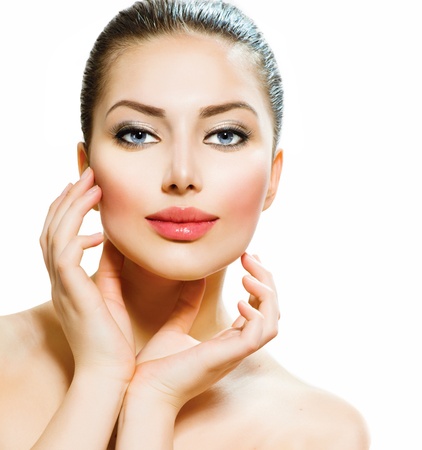 Beautiful Young Woman Touching Her Face の写真素材