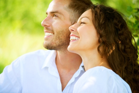 Happy Smiling Couple Relaxing in a Park  Picnic の写真素材