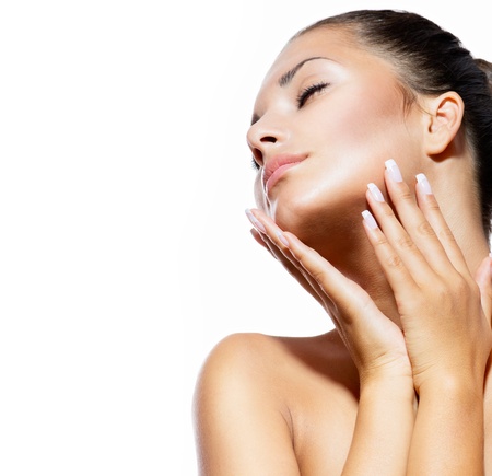 Beauty Portrait  Beautiful Spa Woman Touching her Face の写真素材