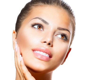 Beauty Portrait  Beautiful Spa Woman Touching her Faceの写真素材