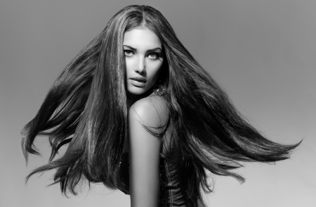 Black and White Fashion Model Girl Portrait with Blowing Hair の写真素材