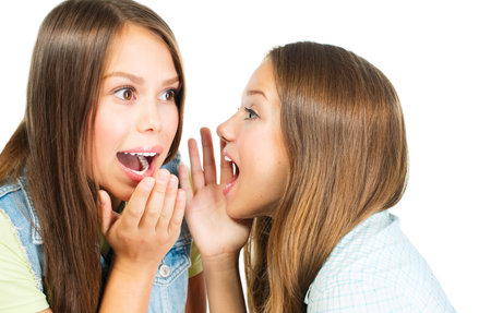 Gossip  Two Teenage Girls Speaking and Sharing Secrets 