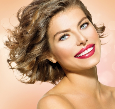 Beauty Young Woman with Short Curly Hair の写真素材