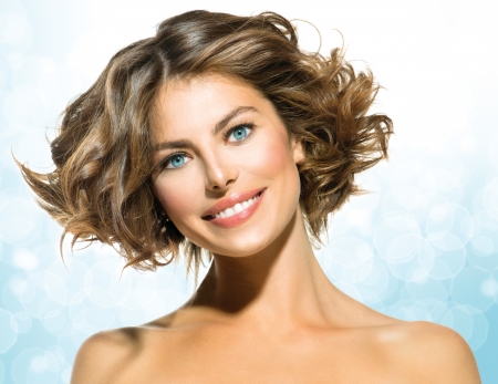 Beauty Young Woman with Short Curly Hair の写真素材