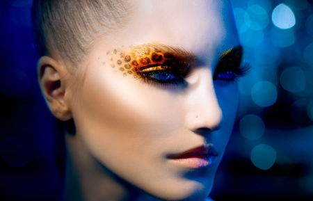 Beauty Fashion Model Girl with Holiday Leopard Makeup の写真素材