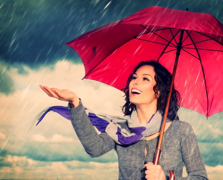 Smiling Woman with Umbrella の写真素材