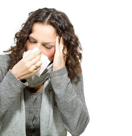 Sick Woman  Flu  Woman Caught Cold  Sneezing into Tissue の写真素材