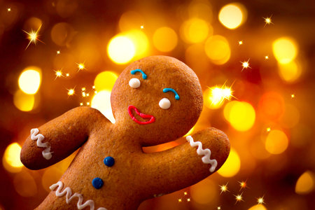 Christmas  Gingerbread Man over Glowing Holiday Backgroundの写真素材
