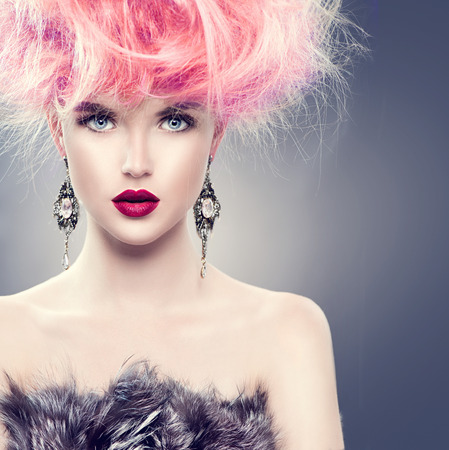 High fashion model girl with updo hairstyle and stylish makeupの写真素材