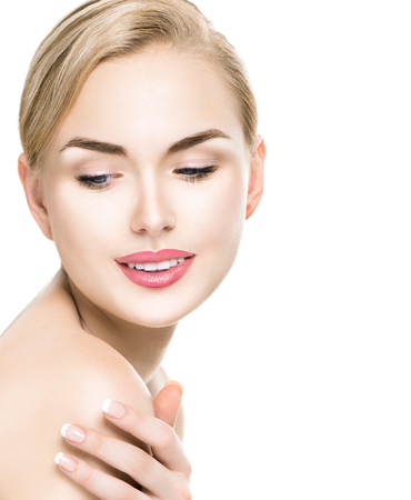 Beauty woman portrait. Beautiful spa girl touching her shoulder Beauty woman portrait. Beautiful spa girl touching her shoulder