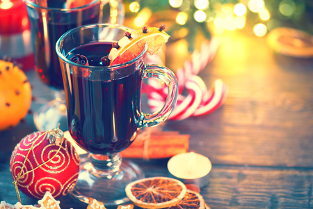Traditional Christmas mulled wine hot drink. Holiday decorated Christmas tableの写真素材