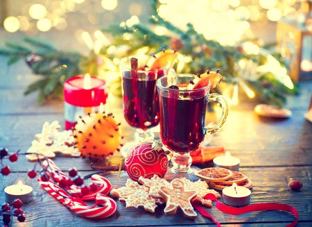 Traditional Christmas mulled wine hot drink. Holiday decorated Christmas tableの写真素材