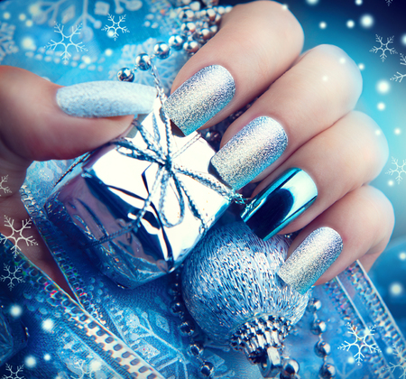 Christmas nail art manicure. Winter holiday style bright manicure design