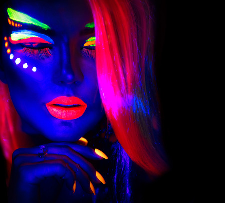 Fashion model woman in neon light, portrait of beautiful model girl with fluorescent make-up