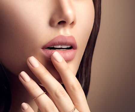 Perfect woman's lips with fashion natural beige matte lipstick makeupの写真素材