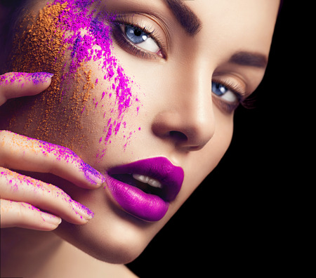 Beauty woman with bright color makeupの写真素材