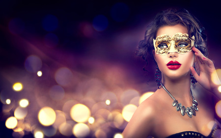 Beauty model woman wearing venetian masquerade carnival maskの写真素材