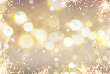 Golden Christmas holiday abstract glitter defocused backgroundの写真素材