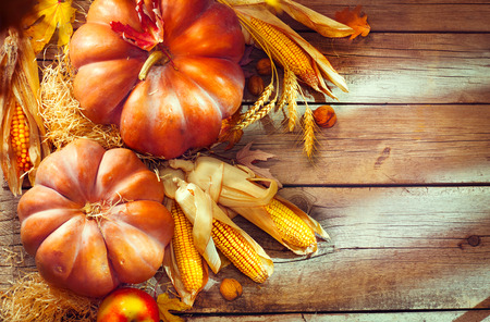 Thanksgiving Day. Autumn Thanksgiving pumpkins over wooden backgroundの写真素材