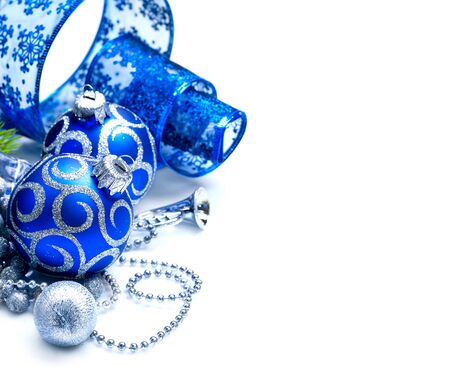 Christmas and New Year Blue blue decoration isolated on white. Border art design with holiday baublesの写真素材
