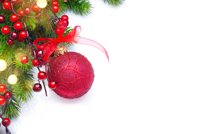 Christmas and New Year background. Red decorations and Christmas tree iisolated on whiteの写真素材