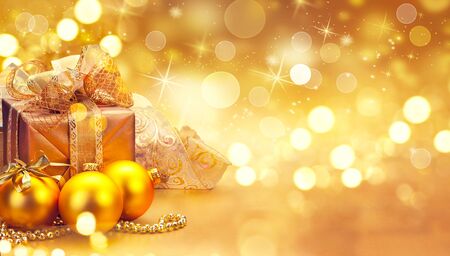 Christmas and New Year golden baubles and decorations. Winter holiday art designの写真素材