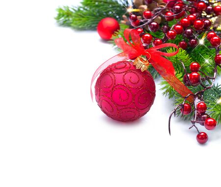 Christmas and New Year background. Red decorations and Christmas tree iisolated on whiteの写真素材