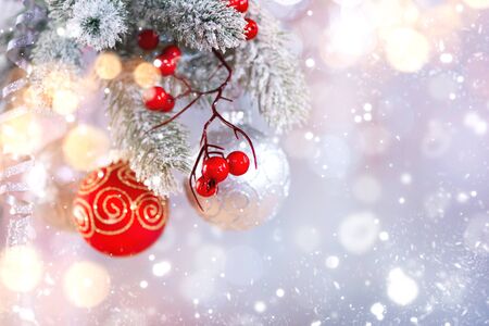 Christmas holiday abstract silver background, Hanging baubles on Christmas treeの写真素材