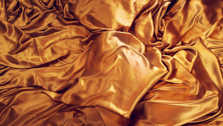 Golden natural silk backgroundの写真素材
