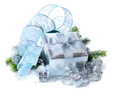 Christmas gift box and decorations isolated on white backgroundの写真素材