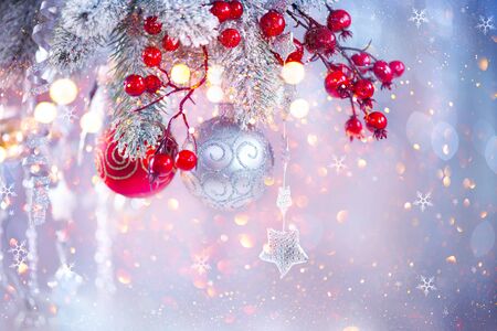 Christmas holiday abstract silver background, Hanging baubles on Christmas treeの写真素材