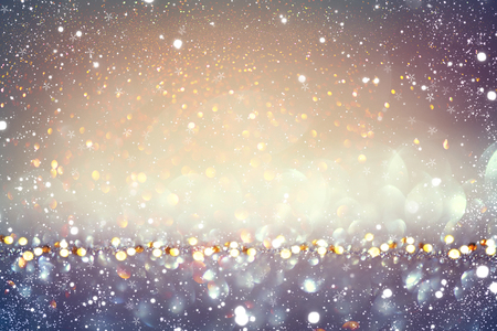 Christmas golden holiday glowing backgroundの写真素材