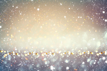 Christmas golden holiday glowing backgroundの写真素材
