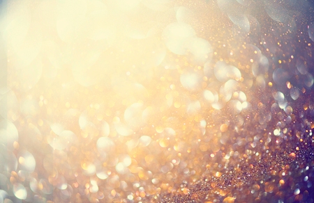 Christmas golden holiday glowing backgroundの写真素材