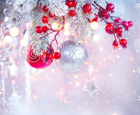Christmas holiday abstract silver background, Hanging baubles on Christmas treeの写真素材
