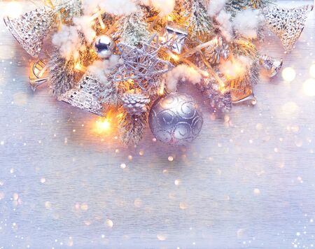 Christmas and New Year decoration over white wood background. Border art design with holiday baublesの写真素材