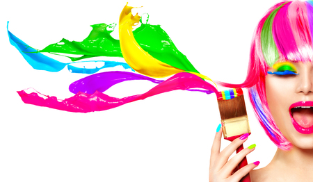 Dyed hair humor concept. Beauty model woman painting her hair in colourful bright colors