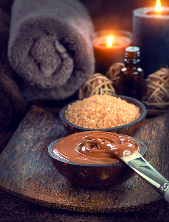 Spa treatment. Chocolate mask, bath salt, brown sugar scrub for skinの写真素材