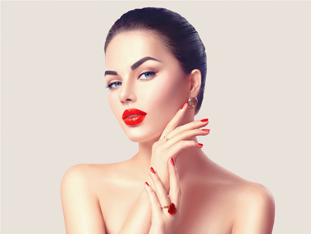 Sexy woman with red lips and nails closeup. Makeup conceptの写真素材